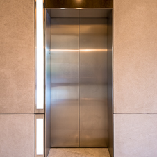 Thumbnail image of open elevator cab door at 3161 Michelson  in Irvine, California